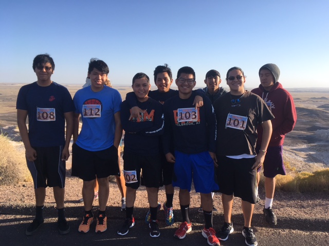 Photo courtesy of Holbrook High SchoolAfter seven weeks of training, eight members of Holbrook High School’s Running Club, including (left to right) Isaiah Wilson, Xavier Slowman, JC Roan, Shawn Lee, Dre Hanley, Trei Jensen, Kobe Teller and Alex Davis, completed the Petrified Forest half-marathon held Saturday, Oct. 21, at the national park. Most of them had never run more than three miles, but through discipline and hard work, all of them finished a very rigorous 13.1-mile course, mostly uphill. “This is a great group of kids that have proven they can finish what they start, both physically and mentally,” commented Running Club sponsor Lelia Demuth. The club is an element of the Holbrook School District’s Healthy Holbrook campaign.