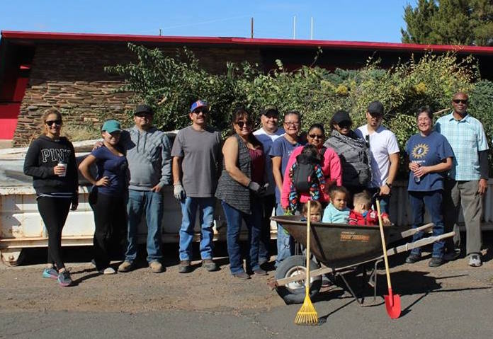 Photo courtesy of Cindy TafoyaMembers of the self-proclaimed Let’s Clean Holbrook Squad did just that on Oct. 21 as they tackled The Plainsman building on West Hopi Drive. The group cleared out weeds, removed debris and washed graffiti from windows, making a tremendous difference along one of Holbrook’s main thoroughfares. Those who took time out of their weekend to serve their community included (left to right) Sonya Brinkerhoff, Katrina Jaime, Johnny Jaime, Ray Bazan, Cindy Tafoya, John Jimenez, Sandy King, Theresa Tafoya holding Elijah Jaime, Tany Tafoya, Levi Tafoya, Tamara Bazan, Mayor Bobby Tyler, (not pictured) Pete Tafoya, John Truscott and Doris Gerwitz. Even the little ones helped out, including (in the wheelbarrow) Remy Tafoya, Hayden Tafoya and Adriel Jaime.
