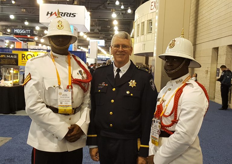 Photo courtesy of Police Chief Larry ScarberSnowflake-Taylor Police Chief Larry Scarber (center) shares a conversation with two commanders from the Bahamas during the International Association of Chiefs of Police conference held recently in Philadelphia, Pa.