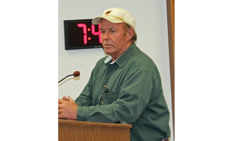 Photo by Toni GibbonsHolbrook resident Buddy DuPree addresses the Holbrook City Council at the Feb. 27 meeting regarding the need for guard railing and signage on Romero and McLaws Road as well as Hennessey Avenue.