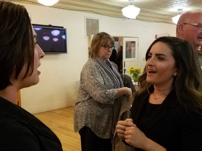 Photo by L. ParsonsBusiness owner Laura Carrell (left) spoke with keynote speaker Jerusha Schmalzel (right) following Friday night’s Chamber of Commerce dinner. Attendees were treated to dinner, and a presentation by Schmalzel highlighting ideas for corporations to do social good.