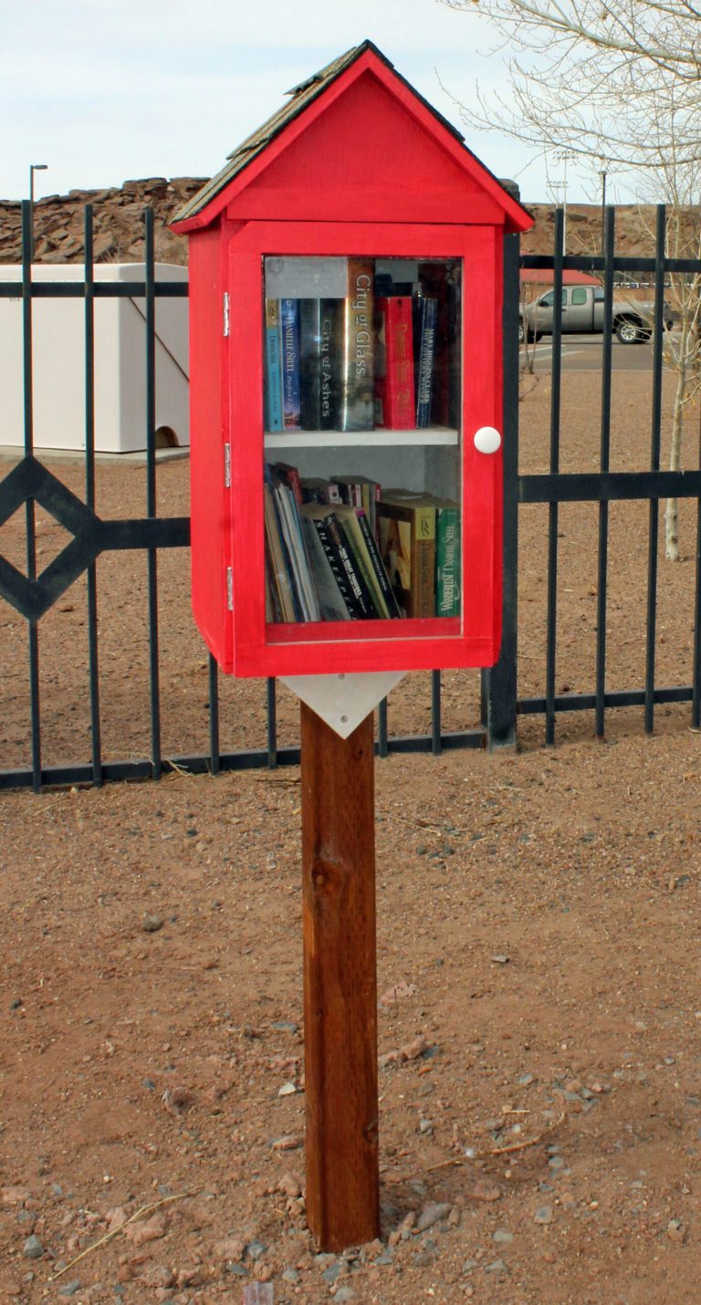 Photo by Toni GibbonsThis little red book box on the corner of Buffalo and Tenth Avenue is one of several available for the public to select their next favorite read.