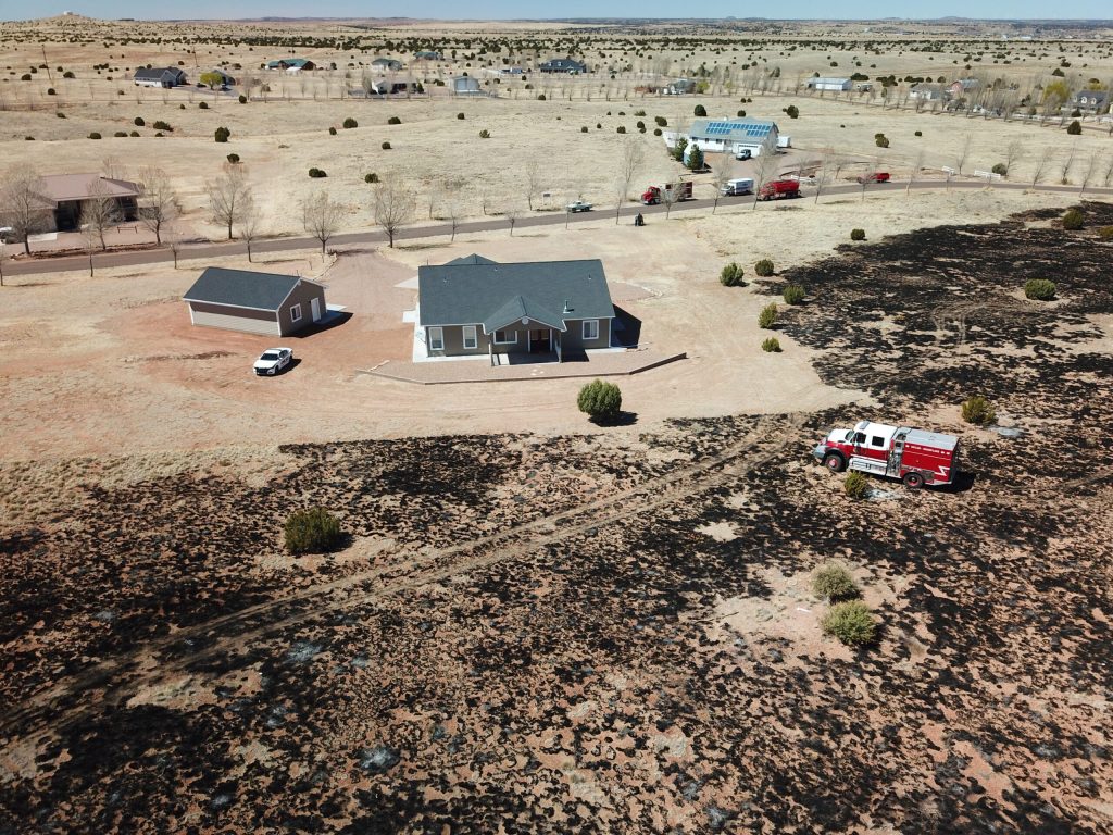 Photo provided by Taylor-Snowflake Fire & Medical DepartmentWind gusts blew a burn pile out of control showing the importance of defensible space surrounding a home. Navajo County recommends 30 to 70 feet of cleared defensible space around the home or at least to the property line.