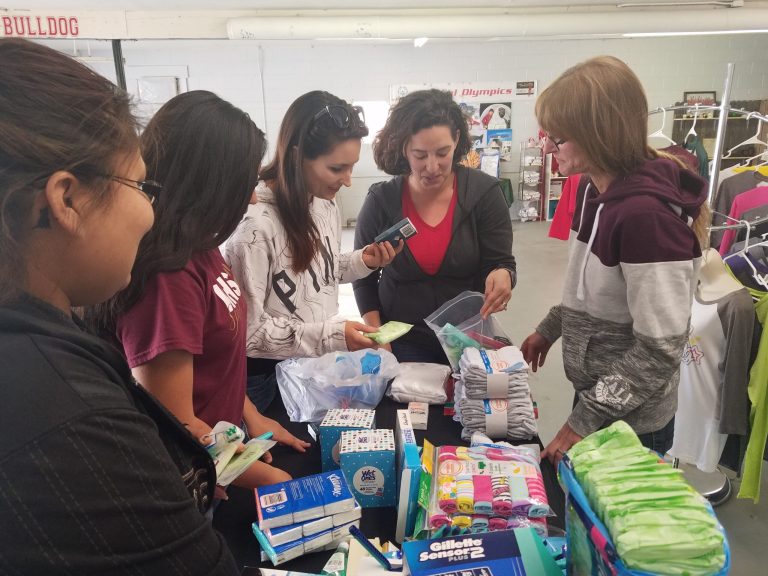 Photo by L. ParsonsMembers of the group, Tinder Fire Donation Crew, met at Small Town Dreams located on West Second Street last week to put together toiletry kits for victims of the Tinder Fire. Pictured are (left to right) Karen Caughey, Aiyanna Amich, Gina Gose, Laura Carrell and Samantha Crisp.