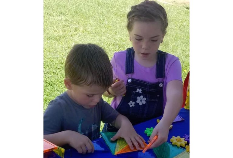 Photo by Sheri HatfieldPayton Hughes (right) and Robert Prine (left) helped kick off the Winslow Library’s summer program, “Libraries Rock.” The program runs through June and July and offers free educational activities for children of all ages. For information, visit the Winslow Library, located at 420 W. Gilmore St.
