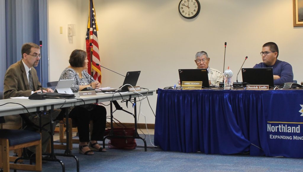 Photo by Diana HutchisonNPC Vice President of Learning & Student Services Mark Vest, (left) board Secretary Daniel Peaches (second from right) and board member Derrick Leslie (right) pay close attention as Chief Business Officer Maderia Ellison (second from left) presents the upcoming budgets for the college.