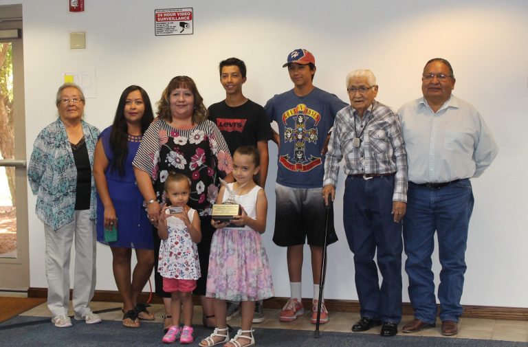 Photo by Diana HutchisonNorthland Pioneer College honored Beaulah Bob-Pennypacker (third from the left), pictured here with her family, with an Administrator Emeritus Award.