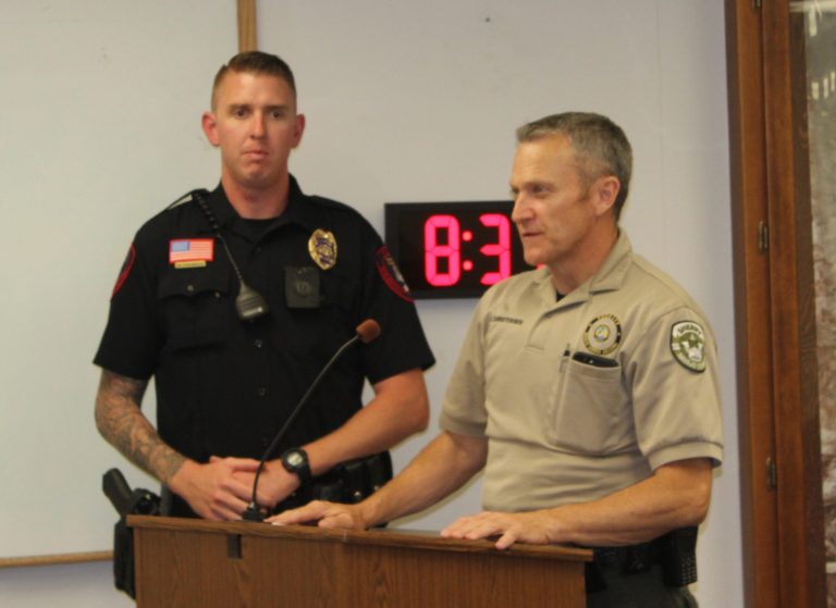 Photo by Toni GibbonsInterim Chief of Police Nathan Christensen (right) introduced Holbrook Police Department’s newest officer, Matthew Theobald (left), to the council at the meeting on June 26.