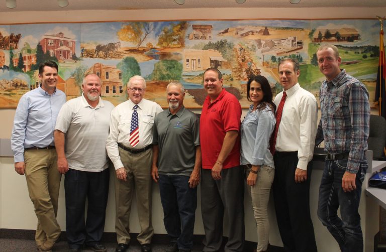 Photo by Diana HutchisonAt the Snowflake Town Council meeting on July 3, the council recognized Don Camacho (center) for his 39 years of service to the community as a town employee and congratulated him on his retirement. Also pictured are council members (left to right) Hunter Lewis and Greg Brimhall, Vice Mayor Kerry Ballard, Mayor Lynn Johnson, and council members Allison Perkins, Byron Lewis and Cory Johnson.