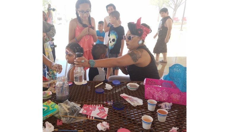 Photo by L. ParsonsSkye Gonnie (right) and other members of the Cherry Bombs charity group helped entertain children and families at the Freedom Fest on July 4 in Winslow. Face painting, games, and a patriotic parade were enjoyed.