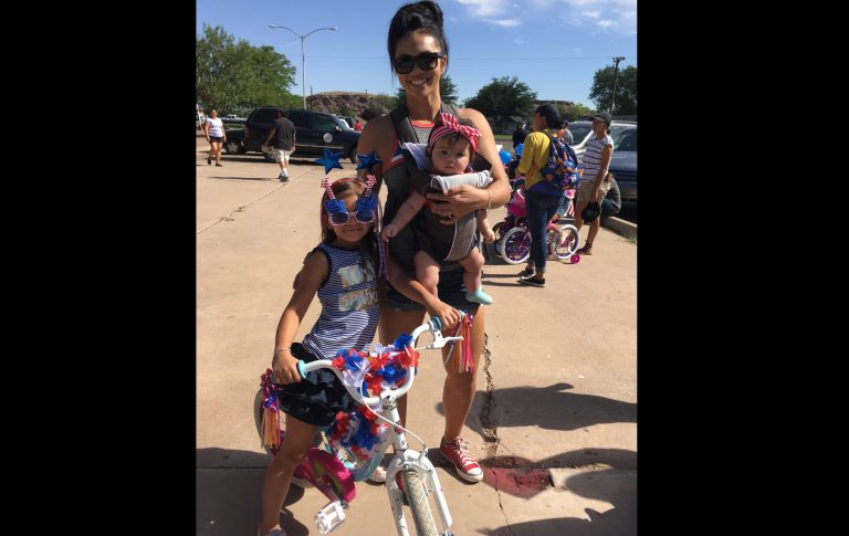 Photo by Linda KorVictoria Black and her kids Kennedy (left) and Peyton (held by Victoria) from Denver were visiting family in Holbrook and were excited to take part in Holbrook’s Fourth of July festivities.