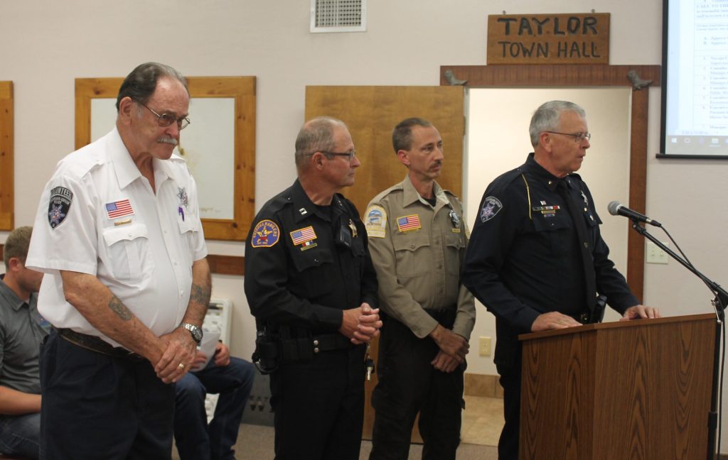 Photo by Diana HutchisonSnowflake Taylor Police Department Chief Larry Scarber (right) recognized volunteers that help with events or in crisis situations. Those recognized include (left to right) Don Anderson, Steve Buck, David Sands, (not pictured) Jimmy Harden and Chase Carlson.
