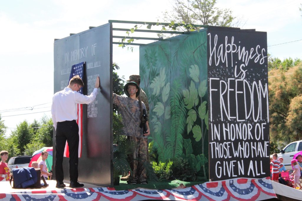 Photos by Diana HutchisonThe parade had a variety of floats including this one that honored those who have served and continue to serve in order to ensure freedom.
