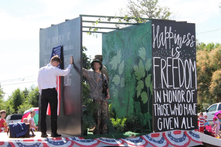 Photos by Diana HutchisonThe parade had a variety of floats including this one that honored those who have served and continue to serve in order to ensure freedom.