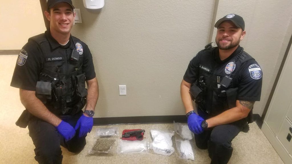 Photo courtesy of Winslow Police DepartmentWinslow Police Officers Robert Downs (left) and Alejandro Barron (right) were involved in a traffic stop last Friday that sent two suspects to jail following the discovery of drugs and stolen items.