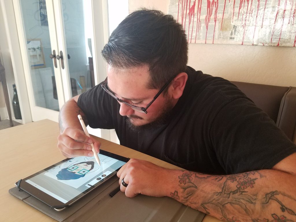 Photo by L. ParsonsJulian Chavez creates works of art on his iPad and has gained the attention of local businesses who appreciate his fresh take on culture represented in the local culture represented in arts.