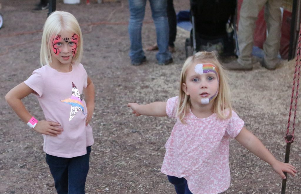 Photo by Spanglepics.comMollie (left) and Hannah (right) Larson, the daughters of Lorin and Lisa Larson of Holbrook, get into the fun of the Navajo County Fair last week with face paints and a little sass.
