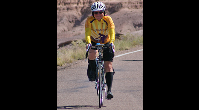 Photo courtesy of Betsyann WilsonWith a smile as big as his heart, Jon Graff of San Jose, Calif., completes the entire 62 mile loop of the Pedal the Petrified on Sept. 15. Graff has been a huge supporter of the event and the Northland Pioneer College Friends and Family scholarship fund.