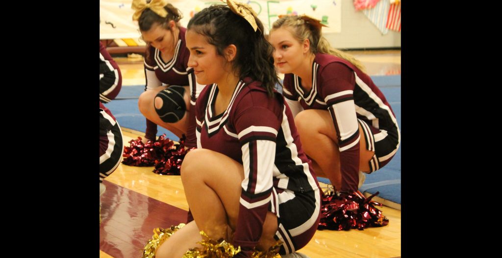 Photos by L. ParsonsSenior Cheer Captain Alayah Brito readied her team before their performance of “Victory” at the Homecoming Assembly.