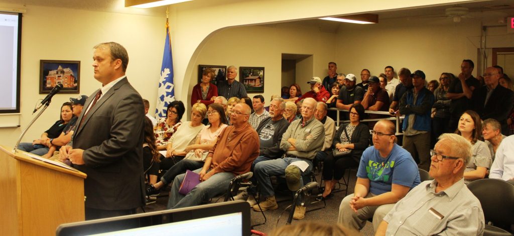 Photo by Toni GibbonsJoseph Holland, a real estate attorney in Snowflake and one of the four members of Abacaxi, LLC, addresses the Snowflake Town Council regarding the rezoning of property on the west side of the town during the meeting on Oct. 2.