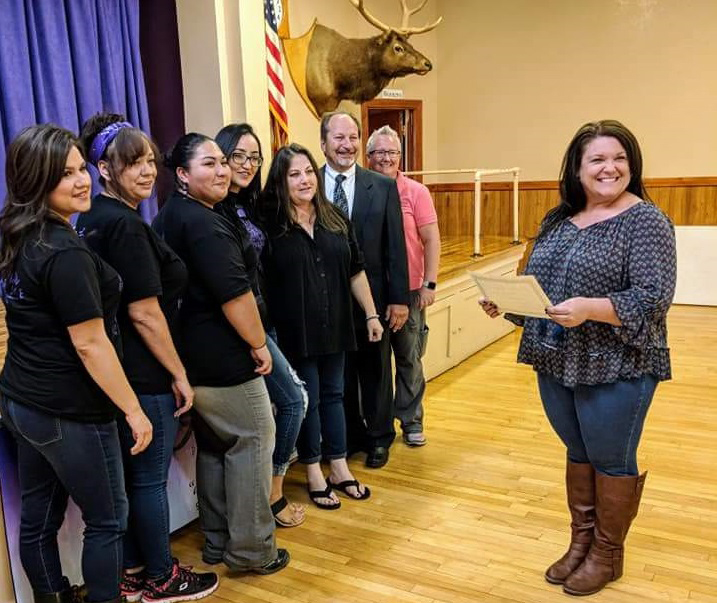 Photo by L. ParsonsDarcey McKee (right) presented Alice’s Place in Winslow, the local domestic violence shelter, with a grant for $3.500 from the Winslow Elks Lodge No. 536. Pictured are (left to right) Alice’s Place Victim advocates Analisa Scofield, Sharon Oliva, Eleysia Reyes and Tiffany Brooks, Alice’s Place Director Theresa Warren, board member Dr. Greg Hackler, and at Little Colorado Medical Center Social Services Director Tiffani Hardman.