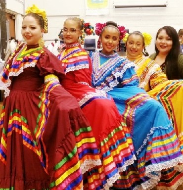 Photo courtesy of Desierto de ColoresSydney Pierce (left), instructor of Desierto de Colores Ballet Folklorico in Holbrook, along with her dancers (Left to right) Mia Iguado, Alexa Quezada and Regina Aguilar, take a moment for a photo op before they continue dancing at the 19th Annual Mariachi and Folklorico Festival at the Chandler Center for the Arts on Oct. 6.
