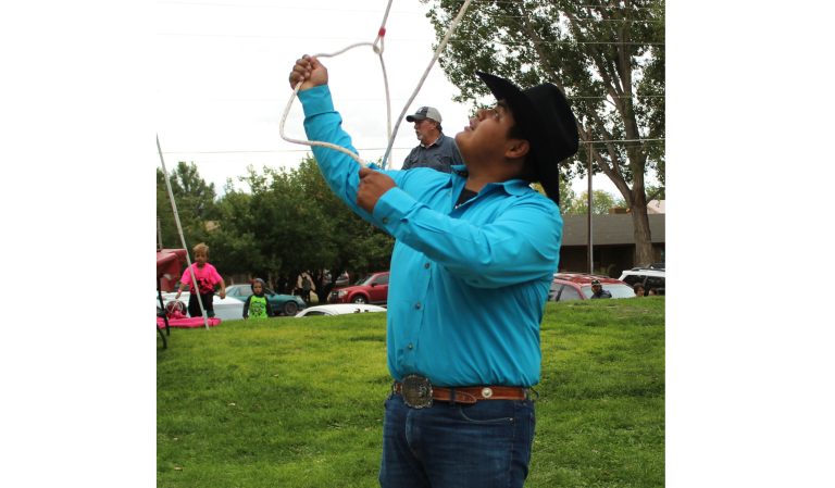 Photo by Toni GibbonsBrittin Shirley, a Navajo Rope Twister, showed off his trick roping skills as one of the entertainers at the Snowflake Harvest Festival. Shirley, a senior at Snowflake High School, grew up in a rodeo family and spent years learning the art of trick roping from some of the pro rodeo crowd.