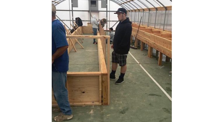 Photo courtesy of Joseph City School DistrictEthan Thomas (pictured) and the rest of the Joseph City High School agriscience class have been working this semester to install an aquaponics system in the school greenhouse.