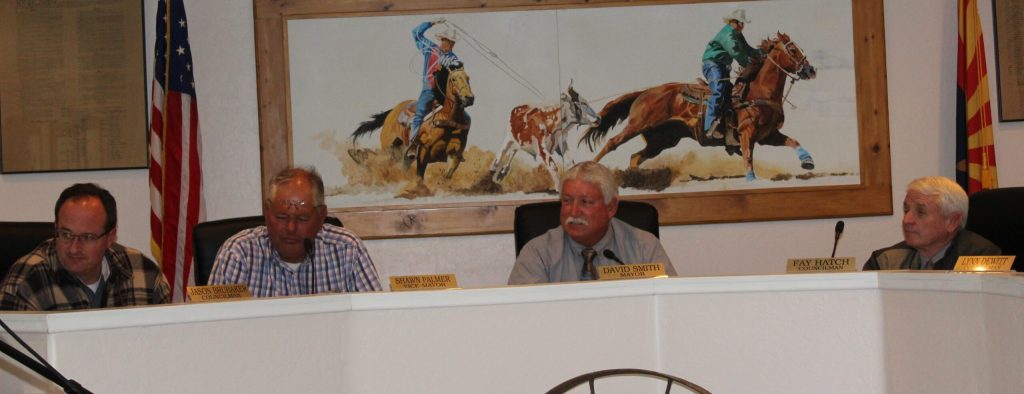 Photo by Toni GibbonsMembers of the Taylor Town Council listen to Town Manager Gus Lundberg give an update on the potential purchase of the 147 acres known as the Roy Palmer Business Park at the meeting on Nov. 1. Pictured are (left to right) Councilman Jason Brubaker, Vice Mayor Shawn Palmer, Mayor David Smith and Councilman Fay Hatch.
