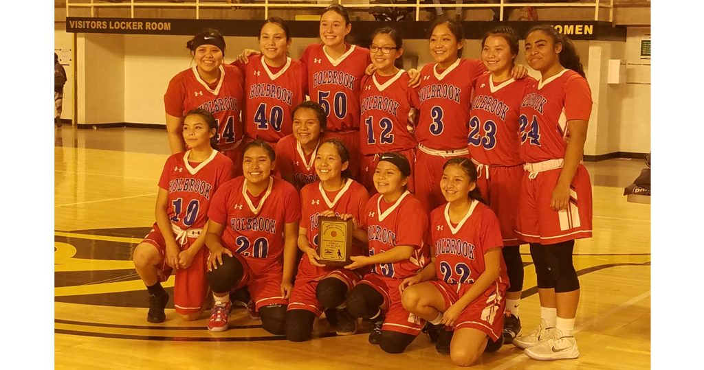 Photo courtesy of Greg PerkinsThe Lady Roadrunners were the champions of the Round Valley Tournament. Players include (front row, left to right) Joycelynn Thomas, Megan Cummings, Sam Billie, Desirae Bain, Talynn Spencer, Mika Joe, (back row) Shilaine Gorman, Tyleashia Yazzie, Matehya Aberle, Abigayle Nez, Tristen Ambrose, Terry Nez and Madison Chappell. Cummings was named to the All Tournament team and Chappell was selected as the tournament MVP.