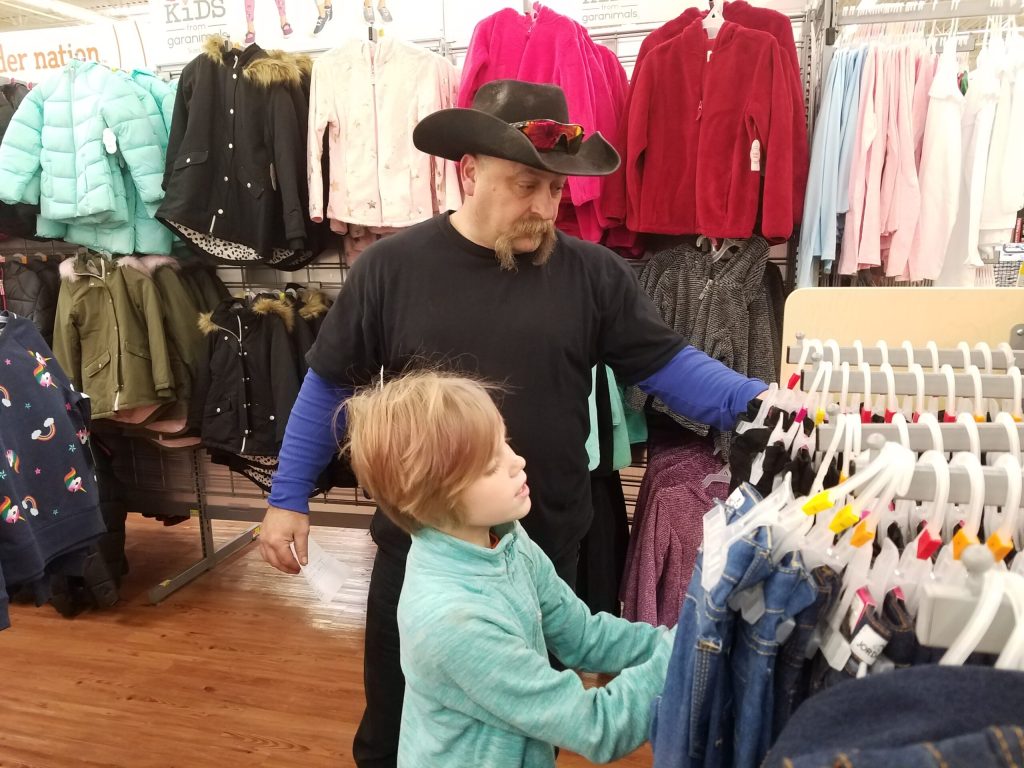 Photo by L. ParsonsWinslow Elks member Richard Carmody (pictured) helps Persephone Hall, 10, to pick out a new outfit.