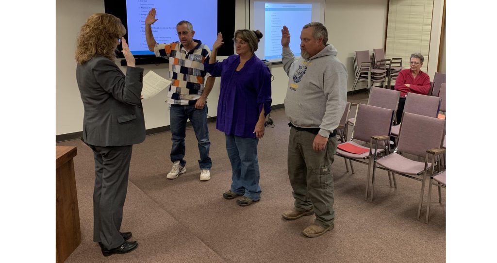 Photo courtesy of Joseph City Unified School DistrictNavajo County Superintendent of Schools Jalyn Gerlich (left) swore in three board members as Joseph City Unified School District Governing Board members earlier this month including (left to right) Karsten Flake, Rhonda Roberson and Dayton Flake.