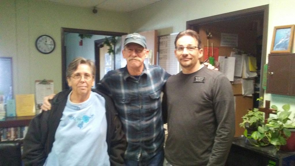 Photo courtesy of the Bread of Life MissionThe Bread of Life Mission in Holbrook held its busiest Christmas dinner to date with Safeway and the Holbrook Police Department donating food to feed everyone and plenty of volunteers to help. Tim (center) and Jeannette (left) Wistrom of Holbrook pictured here with the mission’s Shelter Manager Ron Elseworth (right) were the winners of the 100-gallon fuel raffle. The couple turned right around and donated the gas back for mission use. The fuel was donated by John Bradley of Bradco in Holbrook.