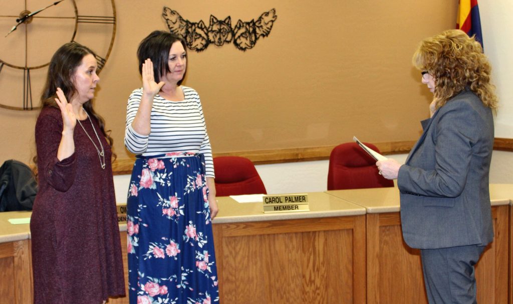 Photo by Toni GibbonsNavajo County Superintendent of Schools Jalyn Gerlich (right) swore-in Wendy McVickers (left) as a new board member and Carole Owens (center) as a continuing board member on the Snowflake Unified School District Board at the Jan. 10 meeting.