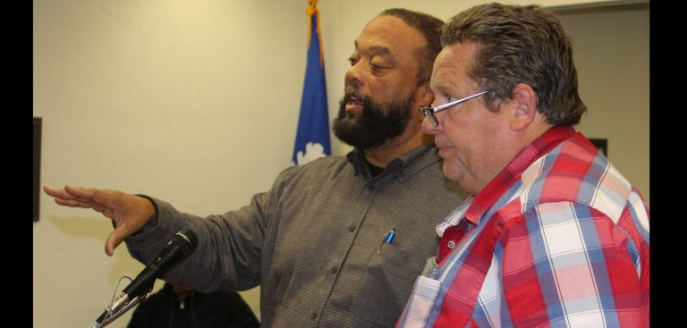 Photo by Toni GibbonsPastor Dave Marshall of Calvary Community Bible Fellowship (left) along with Dale Call (right), building inspector with Snowflake Planning and Zoning, explained the request to develop an administrative office and youth facility on the property located at 89 E. Third S. St. during the Snowflake Town Council meeting.