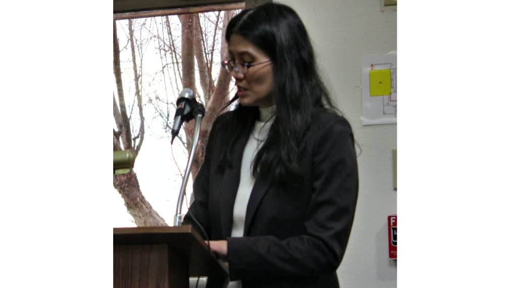 Photo by Toni GibbonsDr. Judy Yip-Reyes, institutional effectiveness director with Northland Pioneer College, addresses the Navajo County Community College District Governing Board regarding preparation for the Higher Learning Commission’s accreditation team.