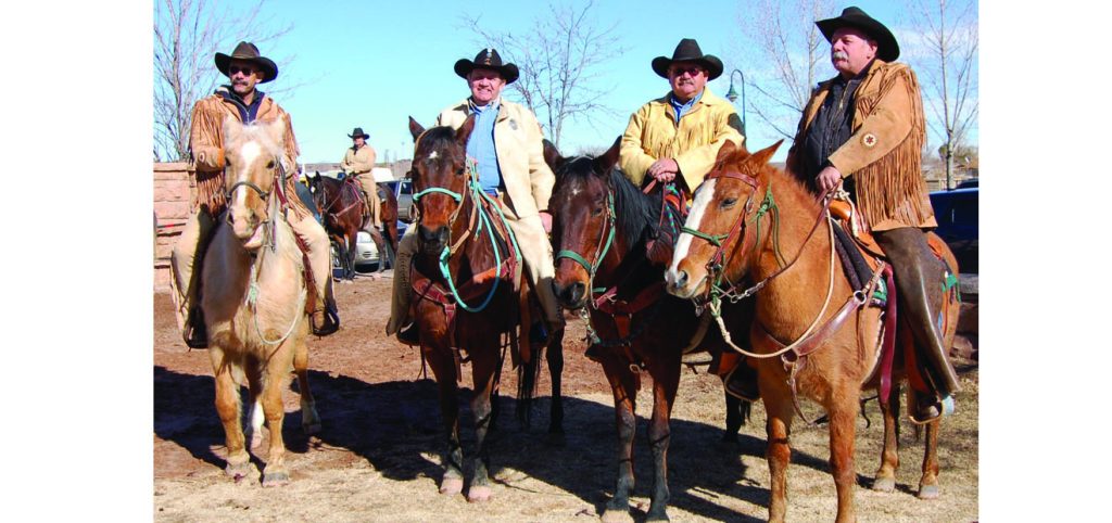 Photo by Linda KorIn a photo from 2009, the Reynolds brothers (left to right) Pat, Carl, Mark and Steve are shown here after being sworn in as mail carriers for the 52nd Annual Hashknife Pony Express Ride.