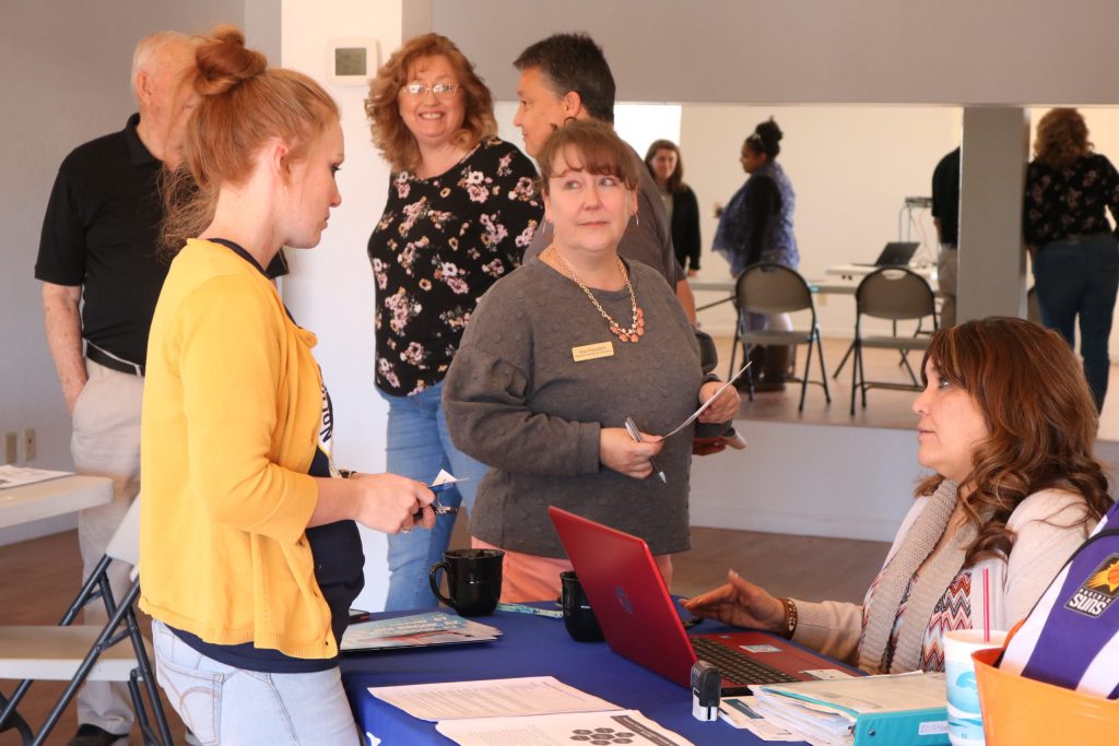 Photo by Linda KorThe Holbrook Chamber of Commerce hosted a public mixer last week to inform residents and businesses about membership and the value of taking part in the chamber. Here Director Cindy Tafoya (right) visits with Northland Pioneer College Recruitment Specialist Rebecca Hunt (left) and regarding opportunities for business owners in Holbrook.