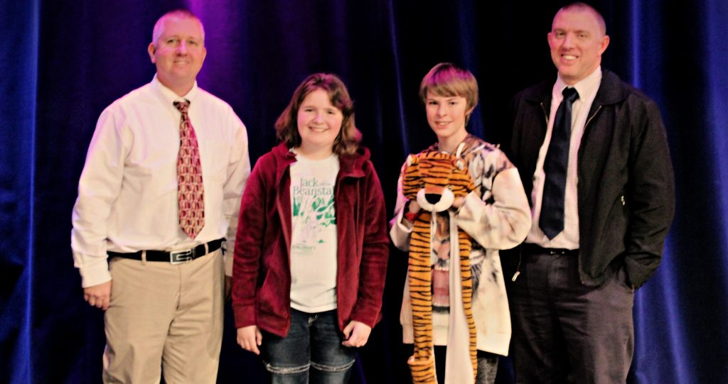 Photo courtesy of Joseph City Unified School DistrictJoseph City School District held its annual spelling bee on Jan. 23 with sixth grader Ashley Bushman the first place winner and seventh grader Peter Miller placing second. Pictured are (left to right) Joseph City Elementary School Principal Daniel Hutchens, Ashley, Peter and Joseph City Junior High/High School Principal Eric Miller.
