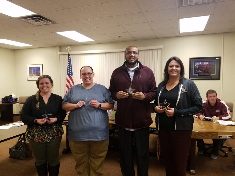 Photo by L. ParsonsWinslow Unified School District recognized its November and December employees of the months. Pictured (left to right) are fifth grade teacher Taylor Bradley, Winslow Junior High School math instructor Eric Petronovich, SAFE room coordinator Ricardo Lyons and Winslow High School assistant principal Deanna McKinney.