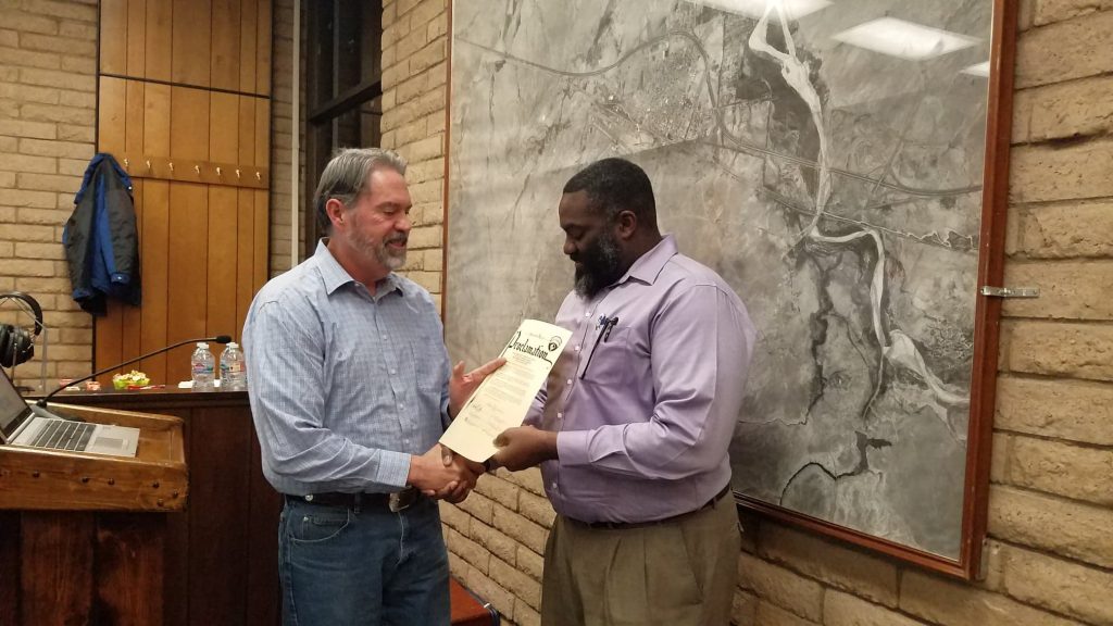 Photo by L. ParsonsWinslow Mayor Tom McCauley (left) presented Kerwin Lawrence (right) of the Winslow Chapter of the NAACP with a Proclamation last month, declaring February as Black History Month in Winslow.