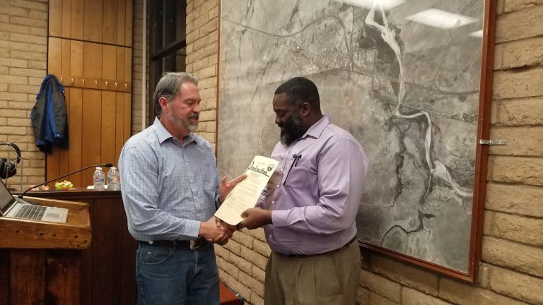 Photo by L. ParsonsWinslow Mayor Tom McCauley (left) presented Kerwin Lawrence (right) of the Winslow Chapter of the NAACP with a Proclamation last month, declaring February as Black History Month in Winslow.