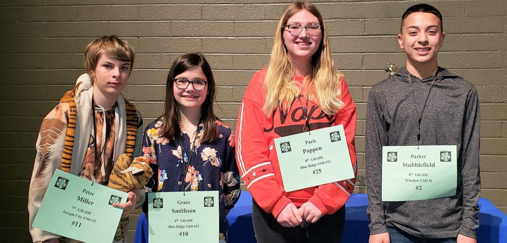 Photo courtesy of the Navajo County Superintendent of SchoolsThe 2019 Navajo County Spelling Bee was held on Feb. 13, at the Snowflake District Auditorium with 62 participants. Winslow Unified School District eighth grader Parker Stubblefield (right) is the champion and will represent Navajo County at the Arizona State Spelling Bee on March 23, in Phoenix. The runner-up is eighth grader Paris Poppen (second from right) from Blue Ridge Unified School District (BRUSD), and there was a tie for third place going to sixth grader Grace Smithson (second from left) from BRUSD and seventh grader Peter Miller (left) from Joseph City Unified School District.