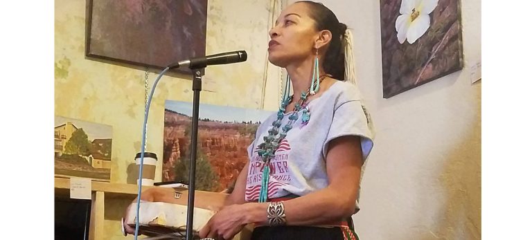 Photo by L. ParsonsRadmilla Cody, a Navajo model, singer and domestic violence activist from Leupp spoke in both Navajo and English to the audience at the Second Annual Phenomenal Women’s art show last week. The show, held at the Gemini Art Gallery, located at 200 N. Kinsley Ave. in Winslow, featured art by and depicting women in empowered positions. Gemini Gallery owner, Linda Card said, “This show is so important. Empowered women, empower women.”