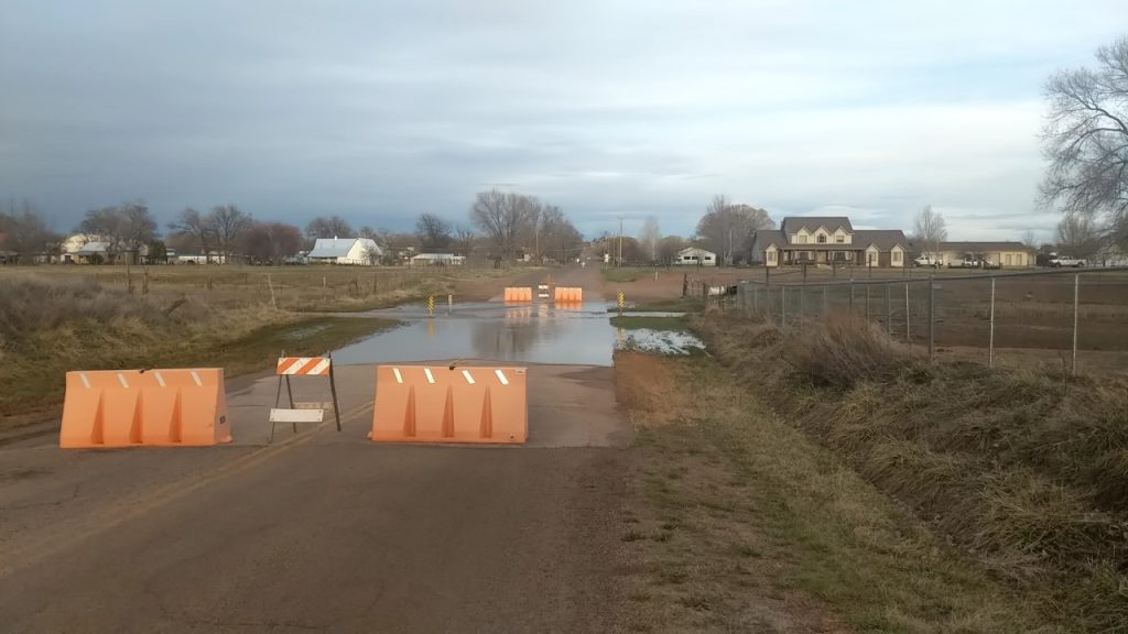 Photo courtesy of the Town of TaylorOn March 21, Town of Taylor staff placed barricades on Willow Lane blocking the creek crossing because of unusual high runoff. There is a malfunction in the Shone's Dam relief gate, which is causing the outflow to be higher than normal. With the abundant amount of water stored upstream, it is anticipated this crossing will be closed for an extended period of time.