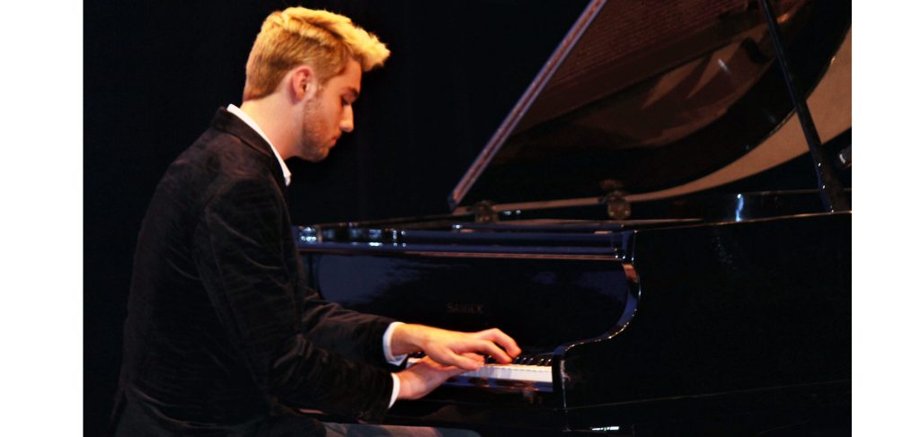 Photo by Toni GibbonsTyler Duncan, a 21 year old blog writer from Show Low, took first place with his piano solo performance of “Shallow” from the movie, “A Star is Born” at the 11th Annual Northland Pioneer College Student Government Association Talent Show in Snowflake.