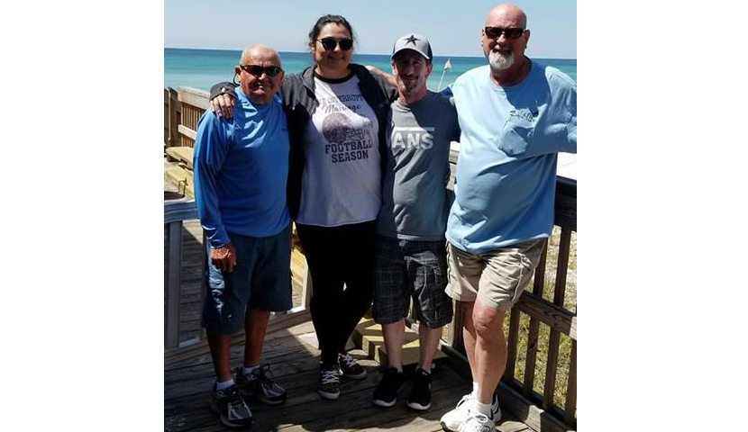 Photo courtesy of Shar GillespieShar and Frank Gillespie take a photo moment while visiting her new found dad in Florida. Pictured (left to right) are Pappy, Shar, Frank and Doug Clegg.