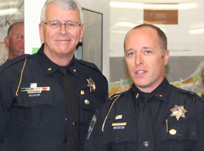 Photo by Toni GibbonsSnowflake-Taylor Police Chief Larry Scarber (left) stands with Lieutenant Bobby Martin (right) who was named the new police chief upon Scarber’s retirement on June 30.
