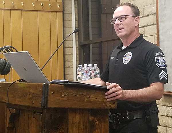 Photo by L. ParsonsWinslow Police Department veteran Afton Foster thanked Chief Brown for his kind words for his career in law enforcement. Foster will retire at the end of May.