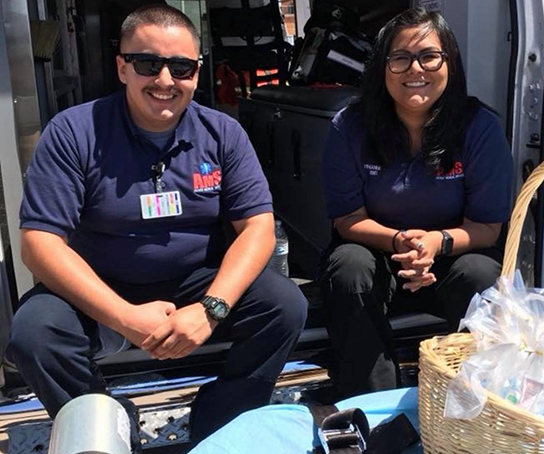 Photo courtesy of Matthew SanchezWinslow EMTs Matthew Sanchez (right) and Annie Weishan (left) take a quick break between calls for service.